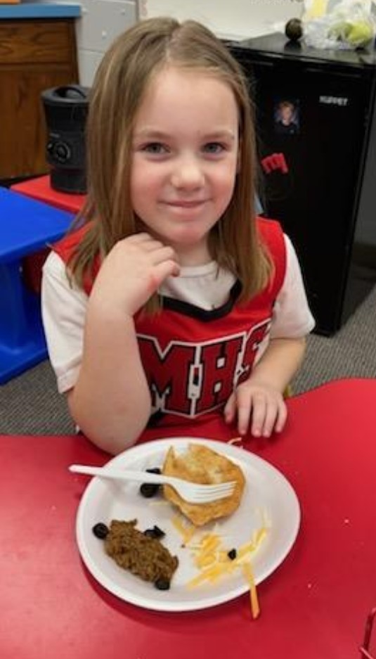 a girl and fry bread