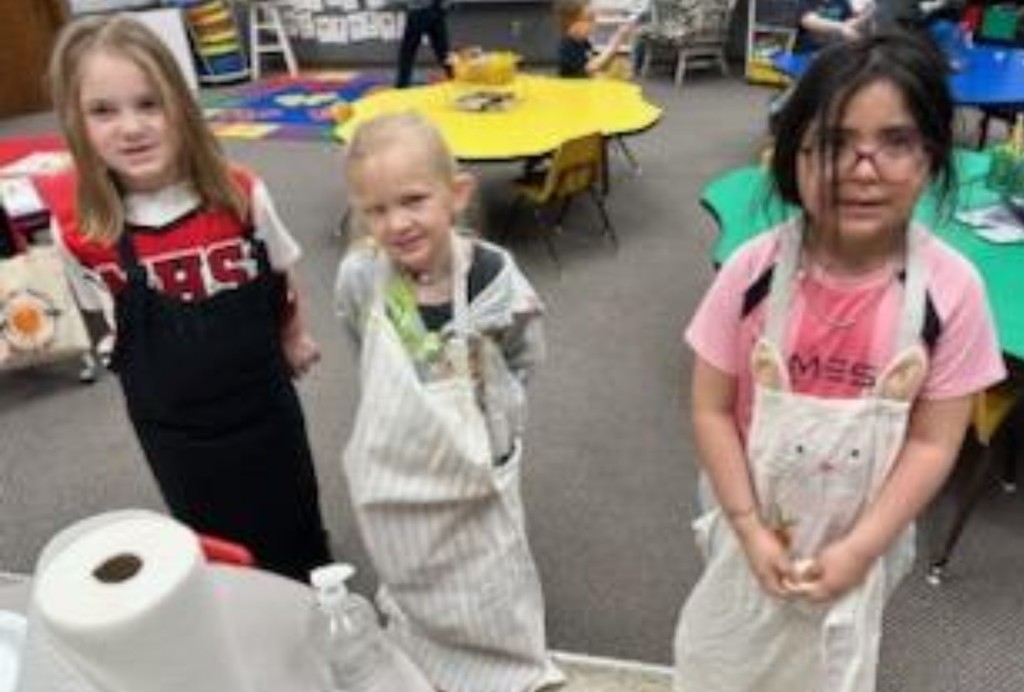 girls getting ready to cook