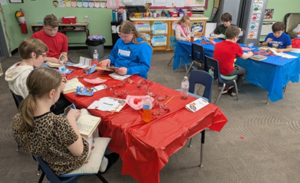 the kids enjoying books.