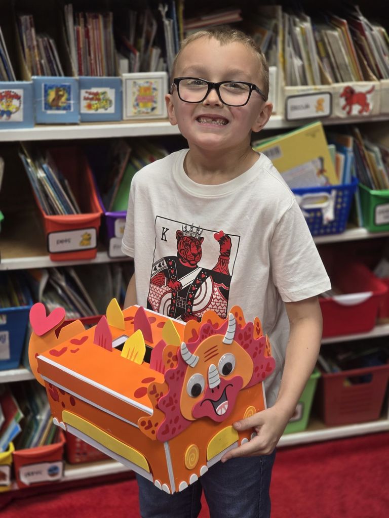 a boy and a dinosaur