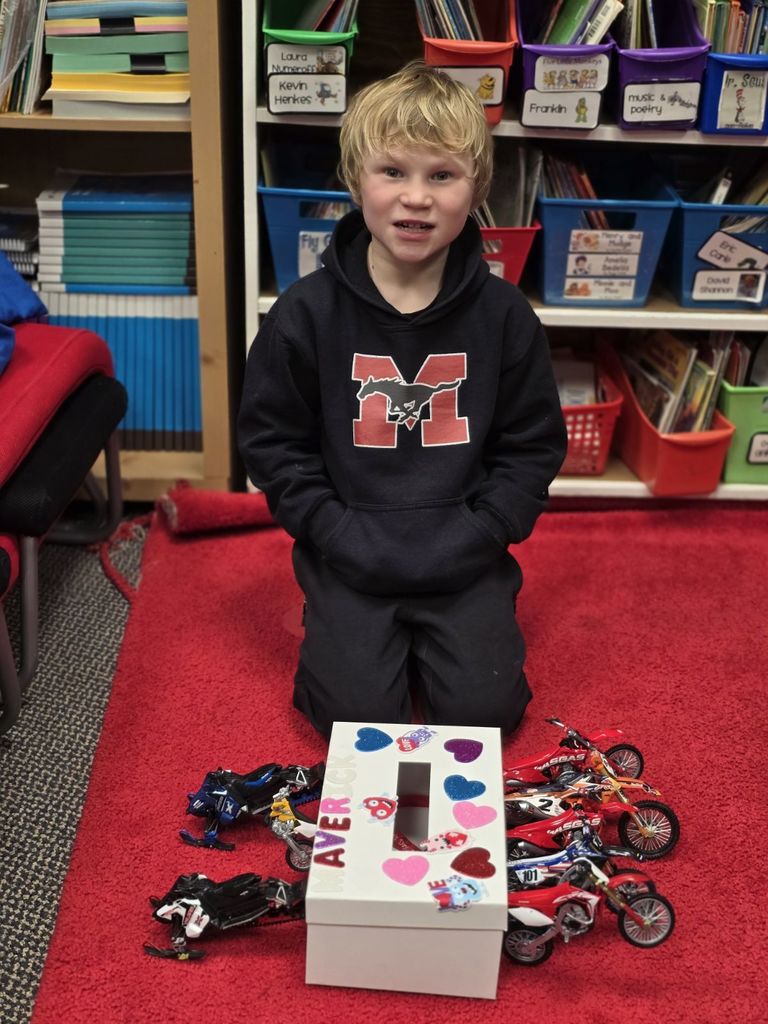 a boy and his racing box