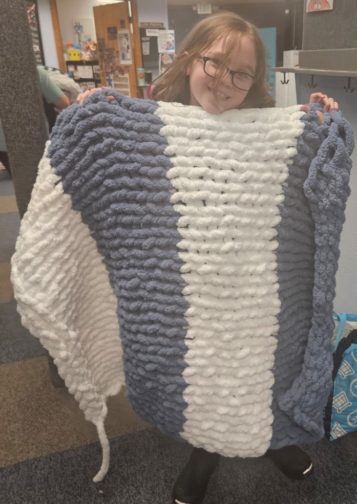 a girl and her blanke