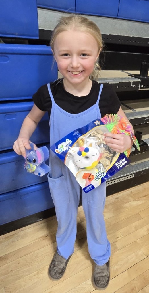 a girl and her prizes