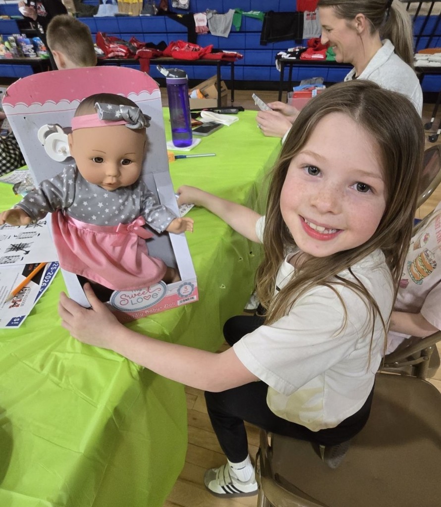 a girl and her prizes