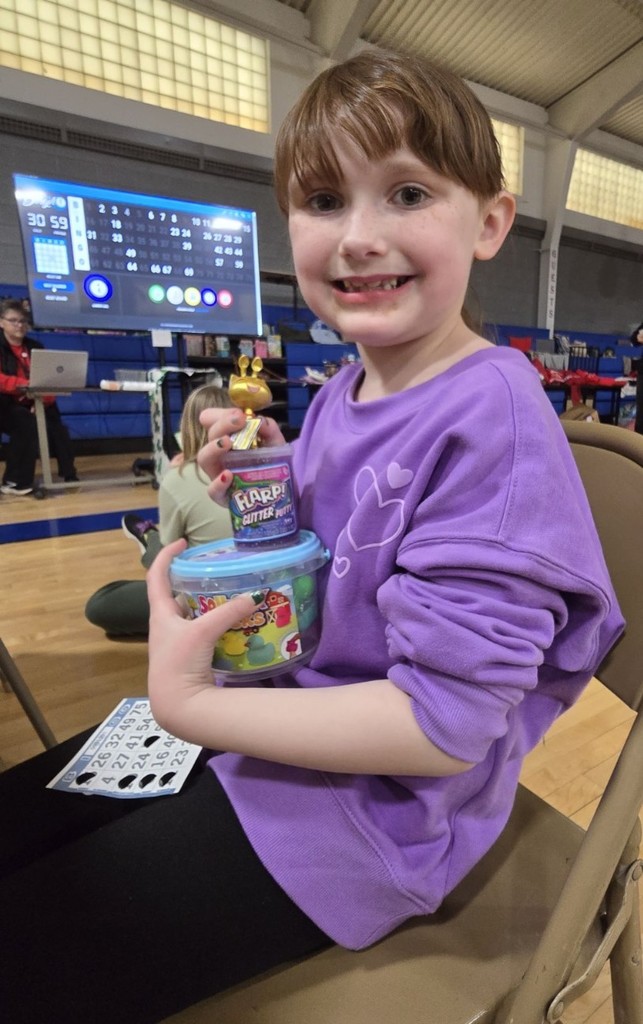 a girl and her prizes