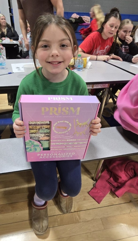 a girl and her prizes