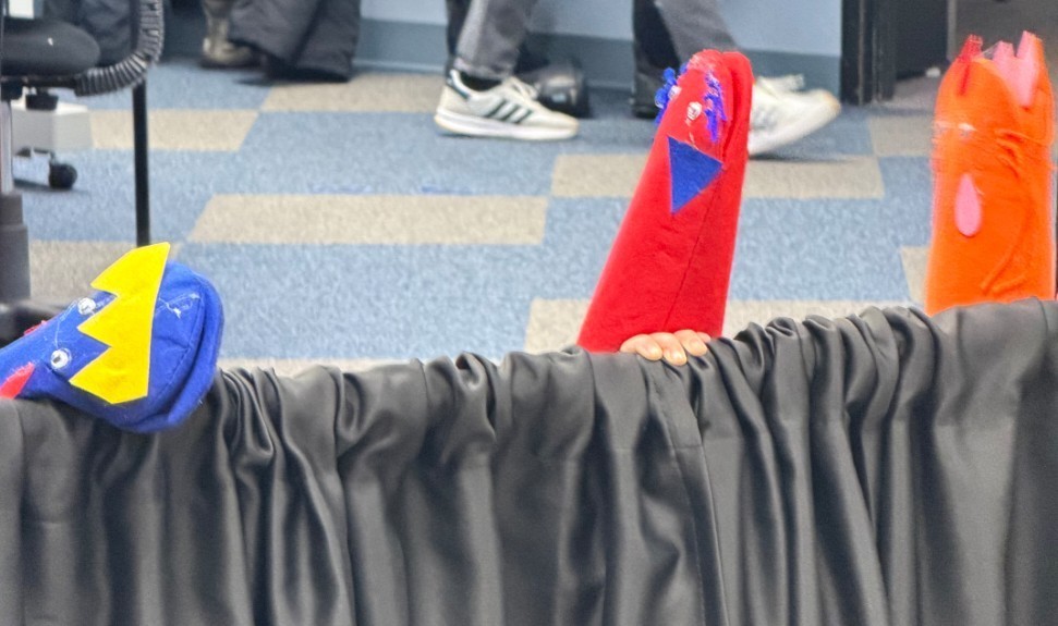 3 puppets in their puppets show