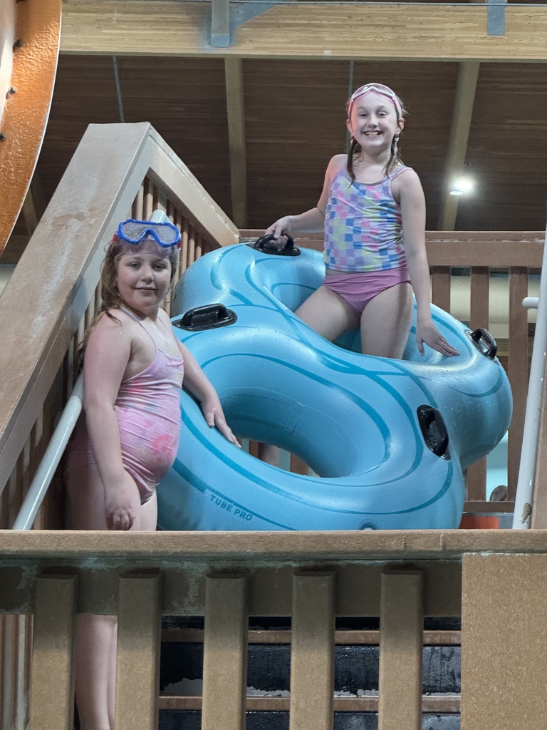 2 girls getting ready for the tubes