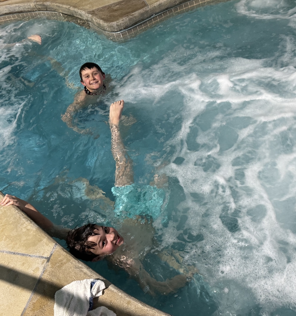 2 boys in the whirl pool