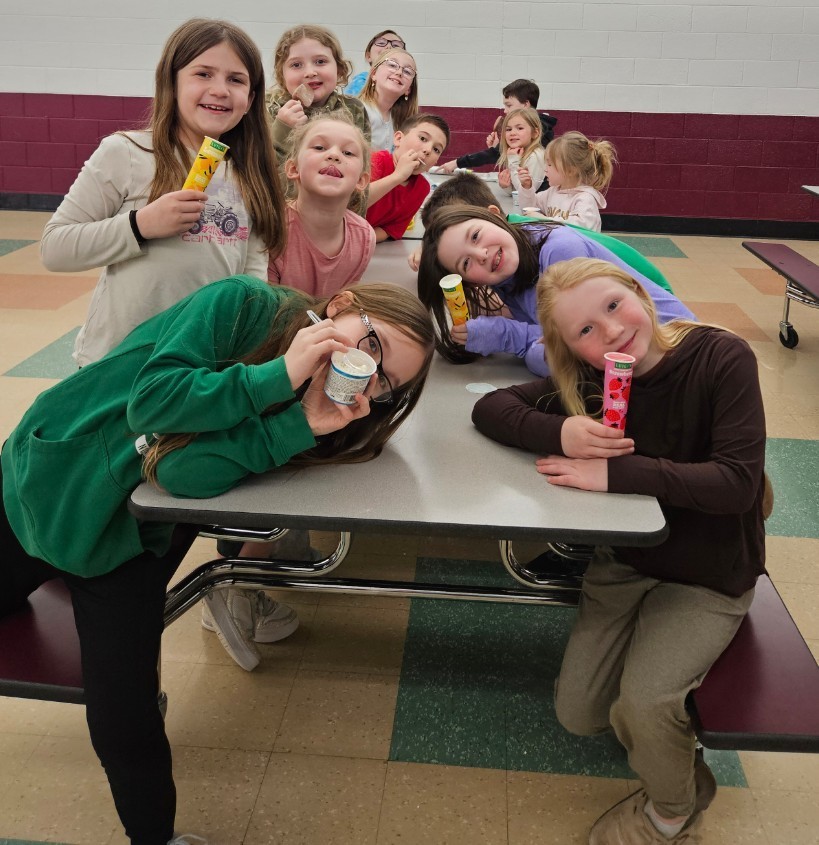 kids enjoying ice cream treats.