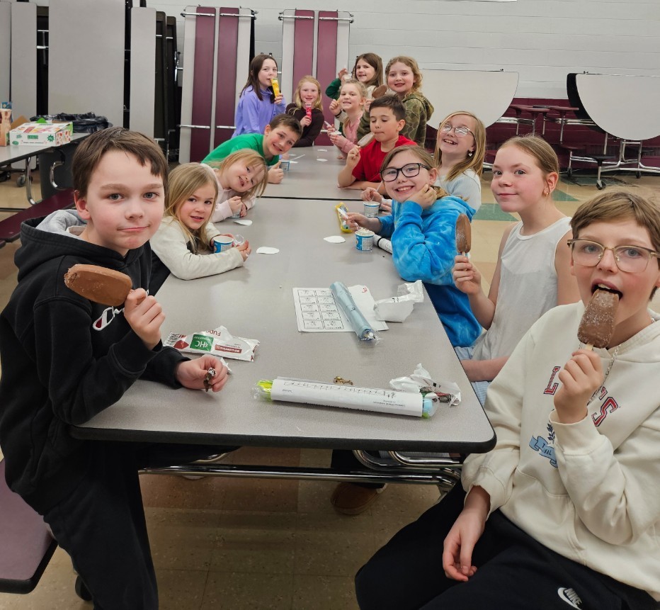 kids enjoying ice cream treats.