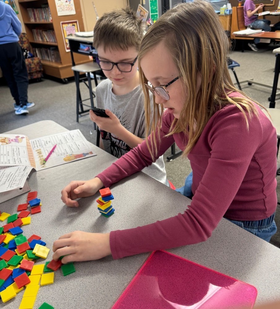 kids stacking blocks