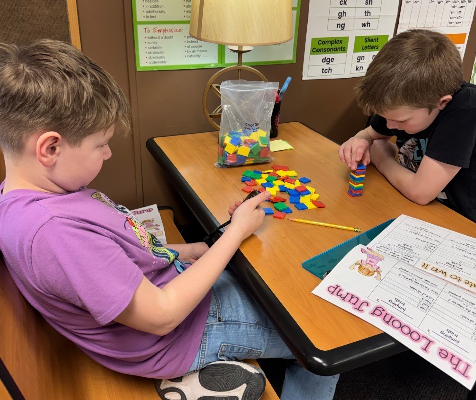 kids stacking blocks