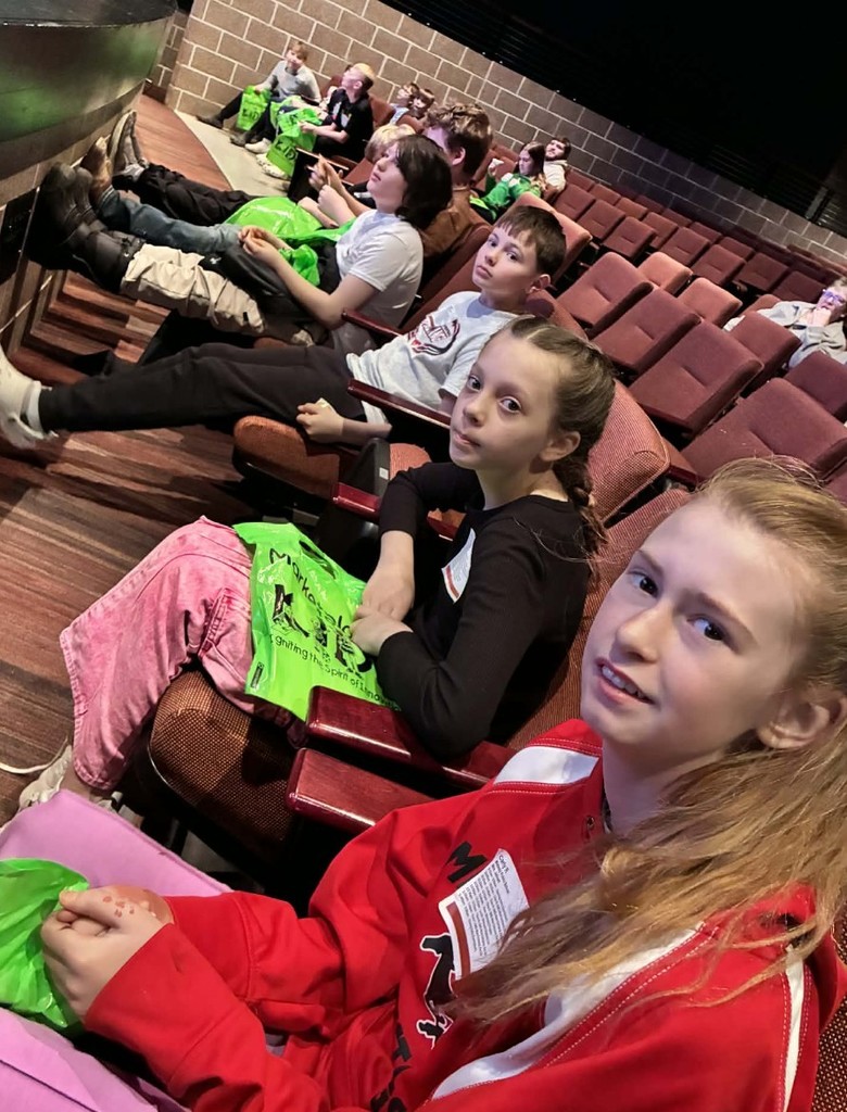 kids listening to a presentation 