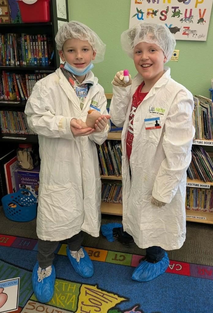 2 kids doing surgery