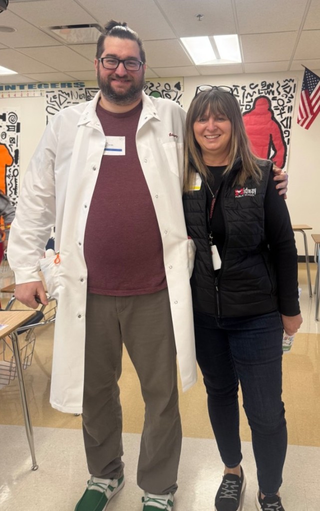 Mrs erickson with a former student