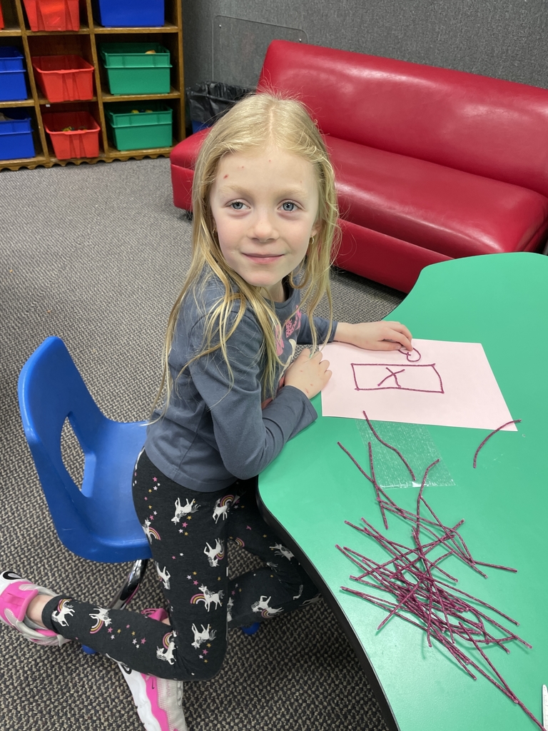 a girl creating with stix
