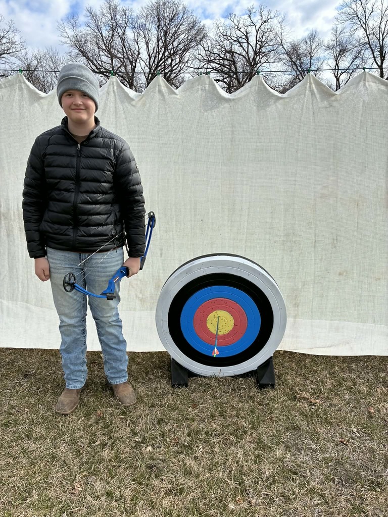 a boy hit the target