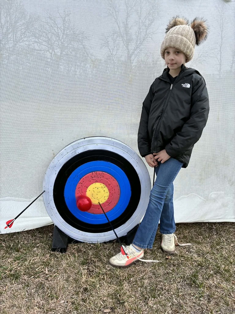 a girl and her arrows