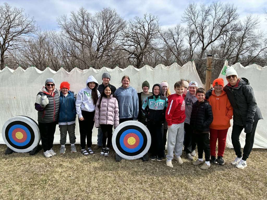 the kids getting ready to learn about archery