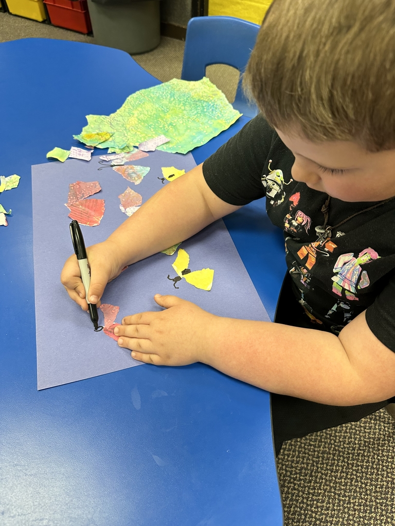a boy drawing 