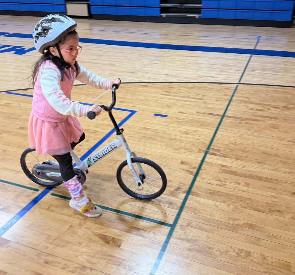 a girl on her bike
