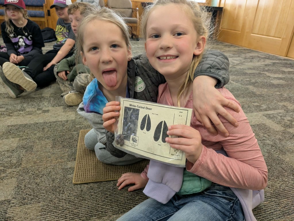 2 girls learning about tracks