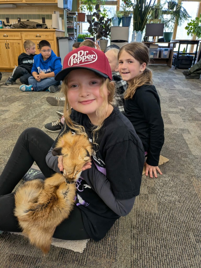 a girl with a fox pelt