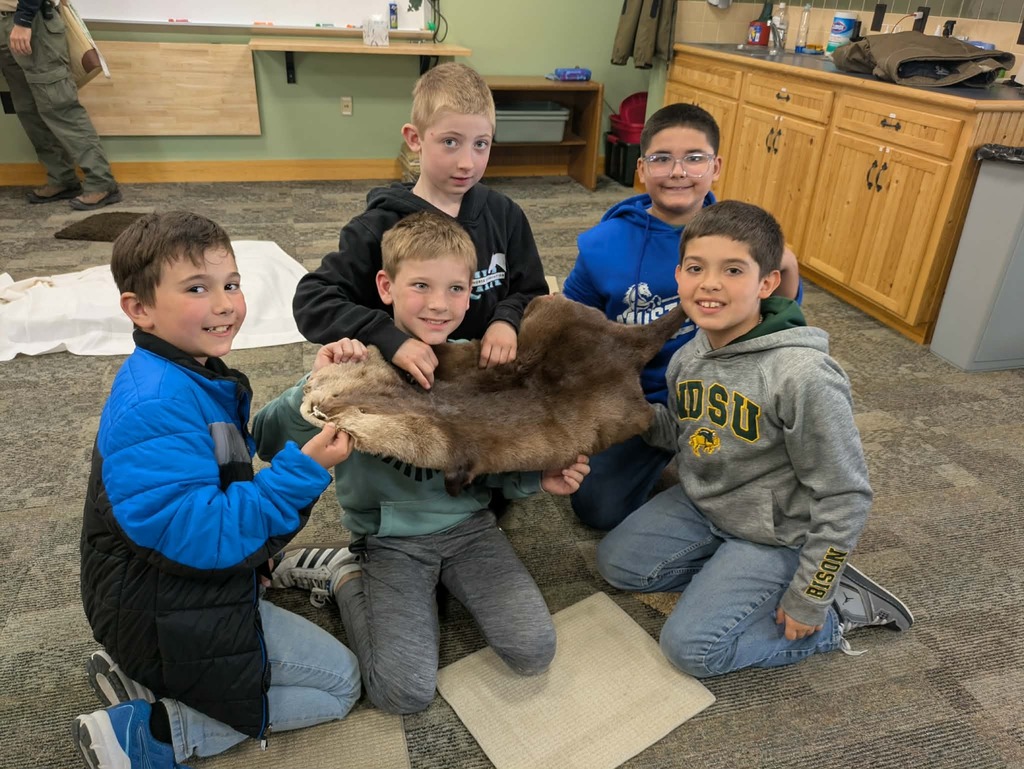 boys touching a pelt
