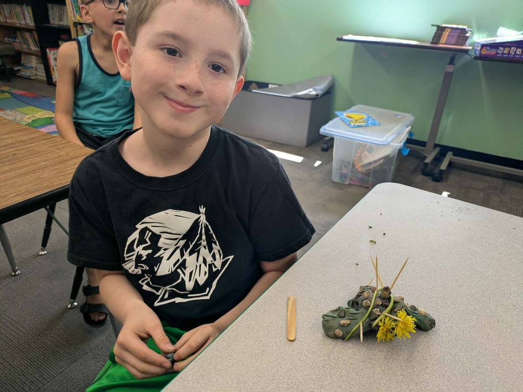 a boy with his stone fish