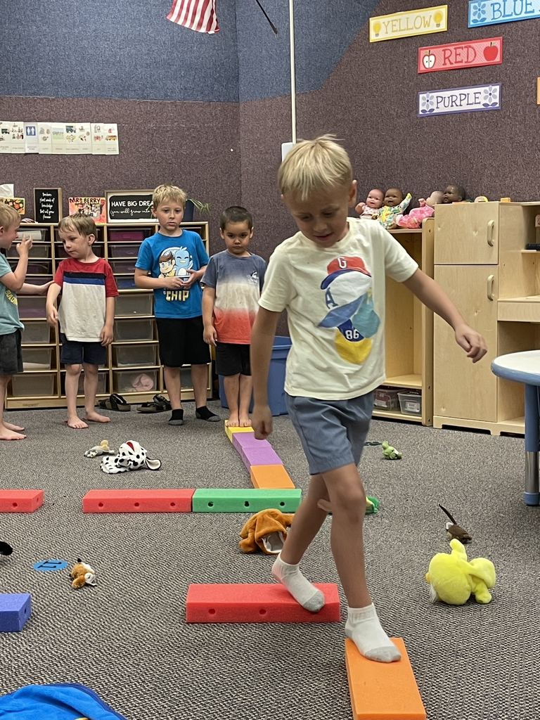 a boy walking the plank.