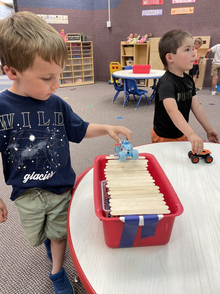 a boy building a bridge.