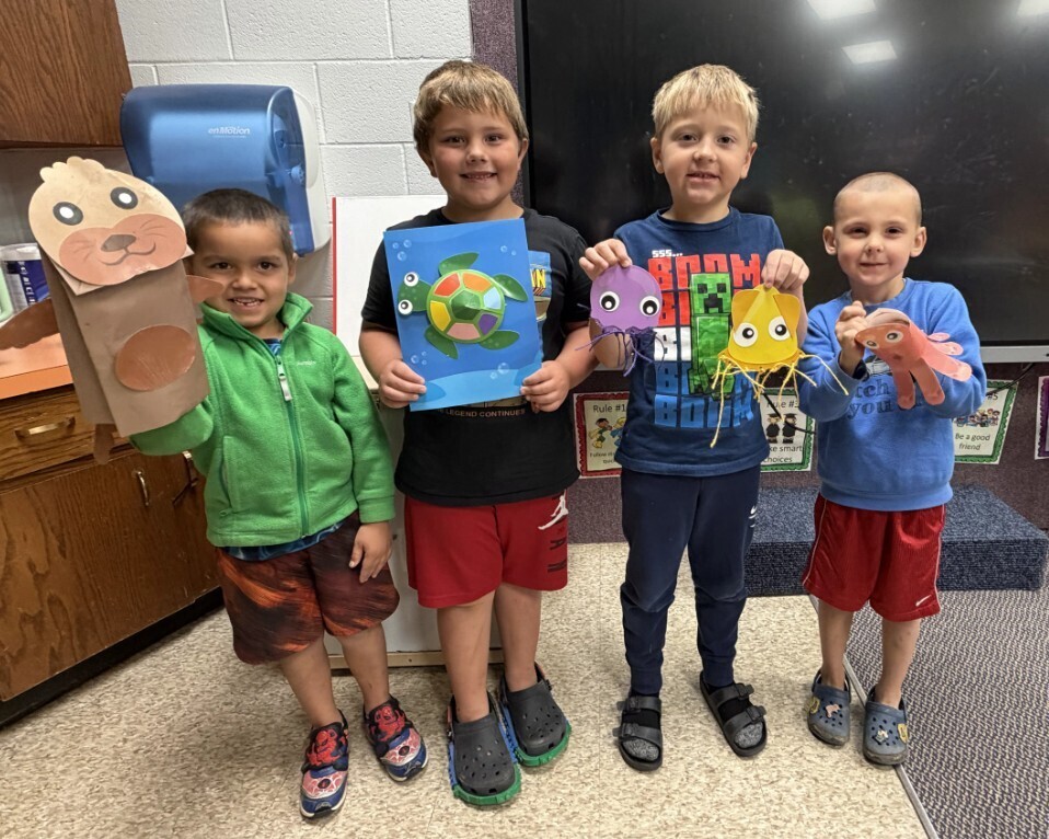kids and their ocean puppets