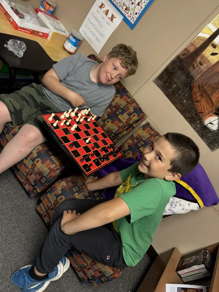 2 boys playing chess