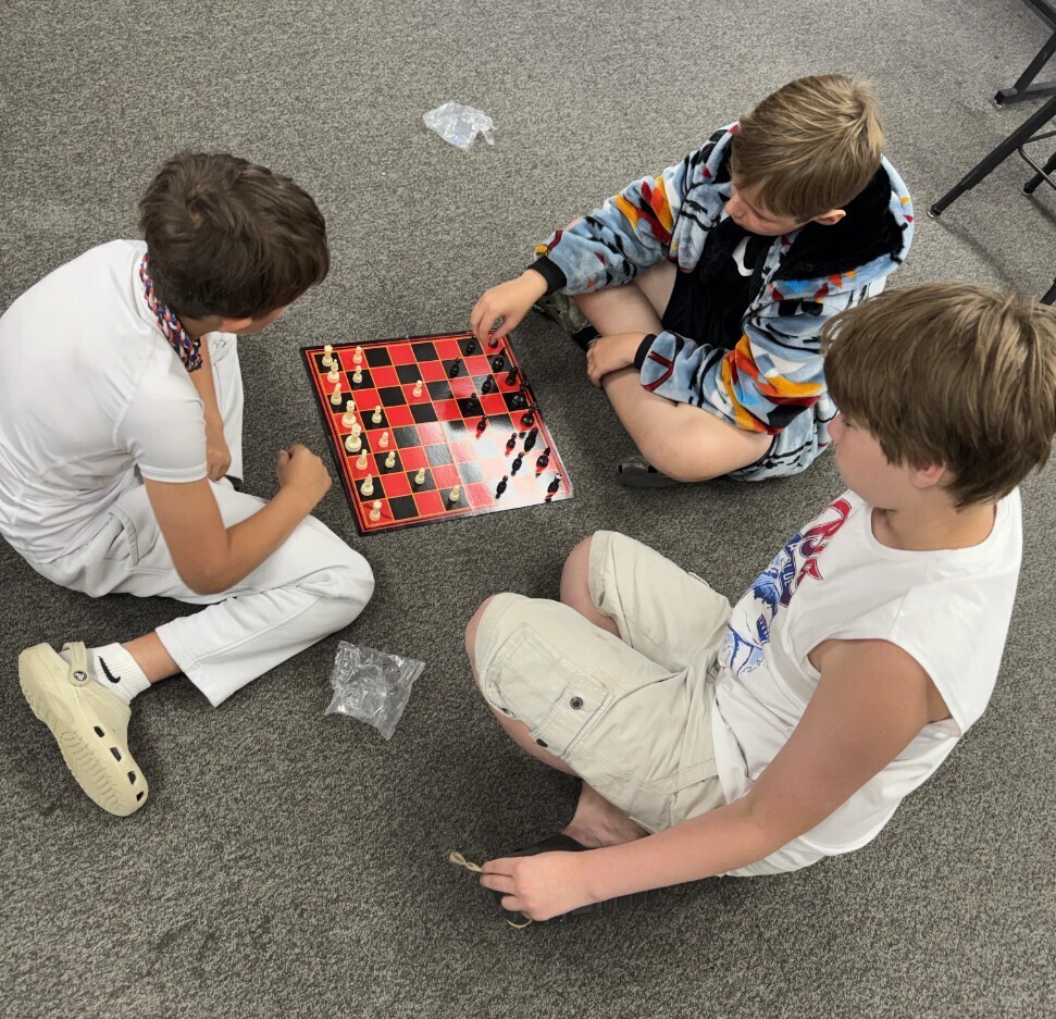 boys playing chess