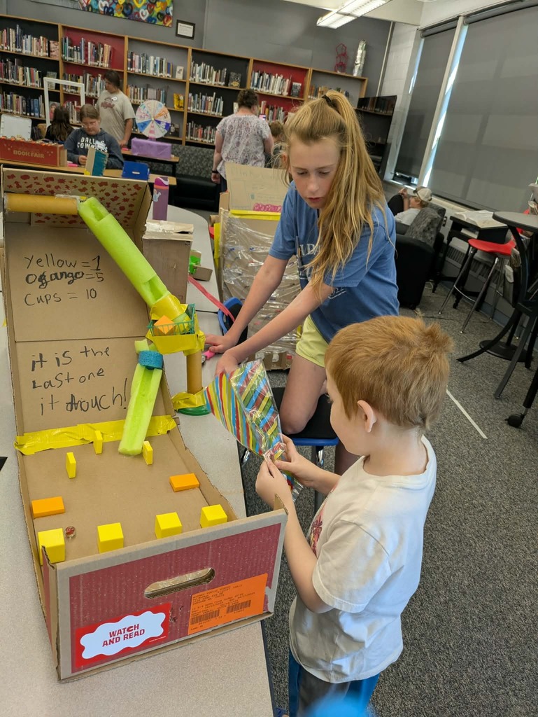 a kids playing marble drop