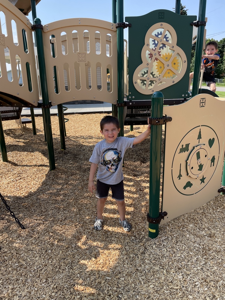 a boy playing on the playground