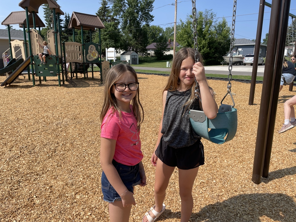 girls at the swings