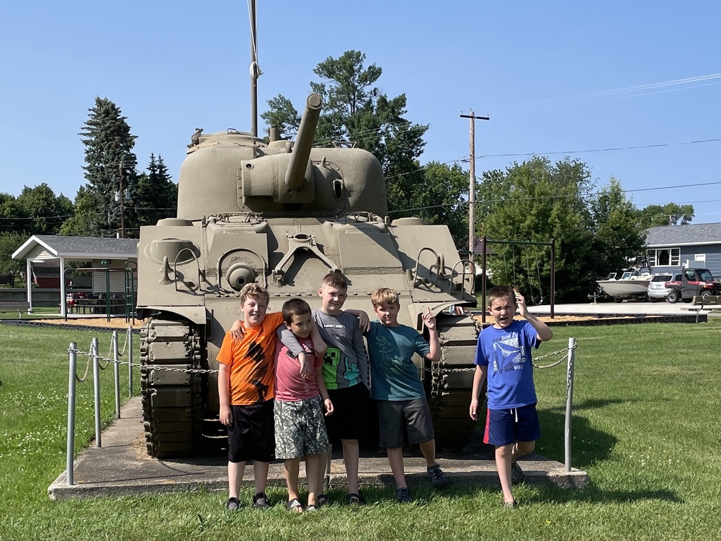 boys infront of the tank.