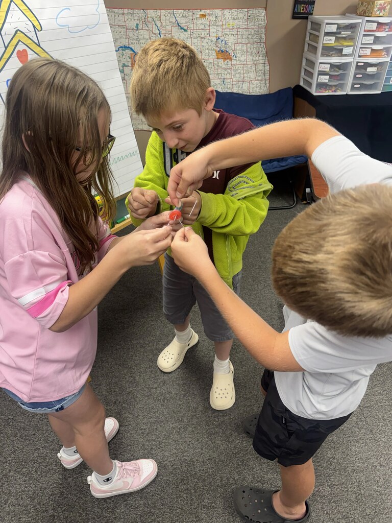 the kids saving Fred.