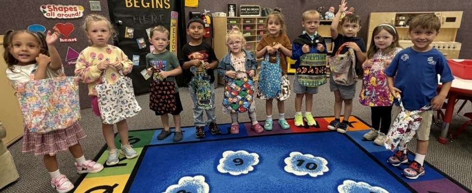 the preschoolers and their book bags