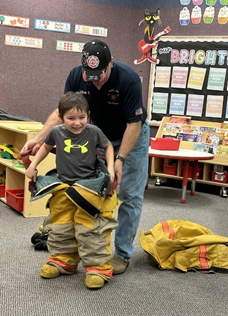 a boy getting the gear on