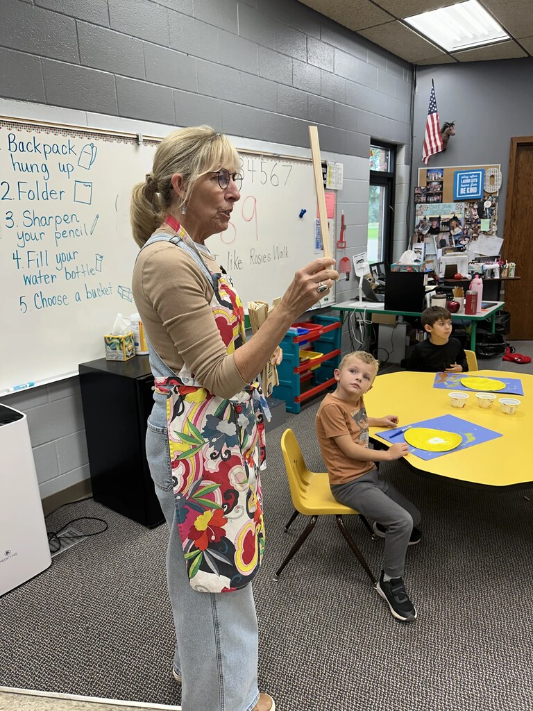 mrs Branvold showing what to paint