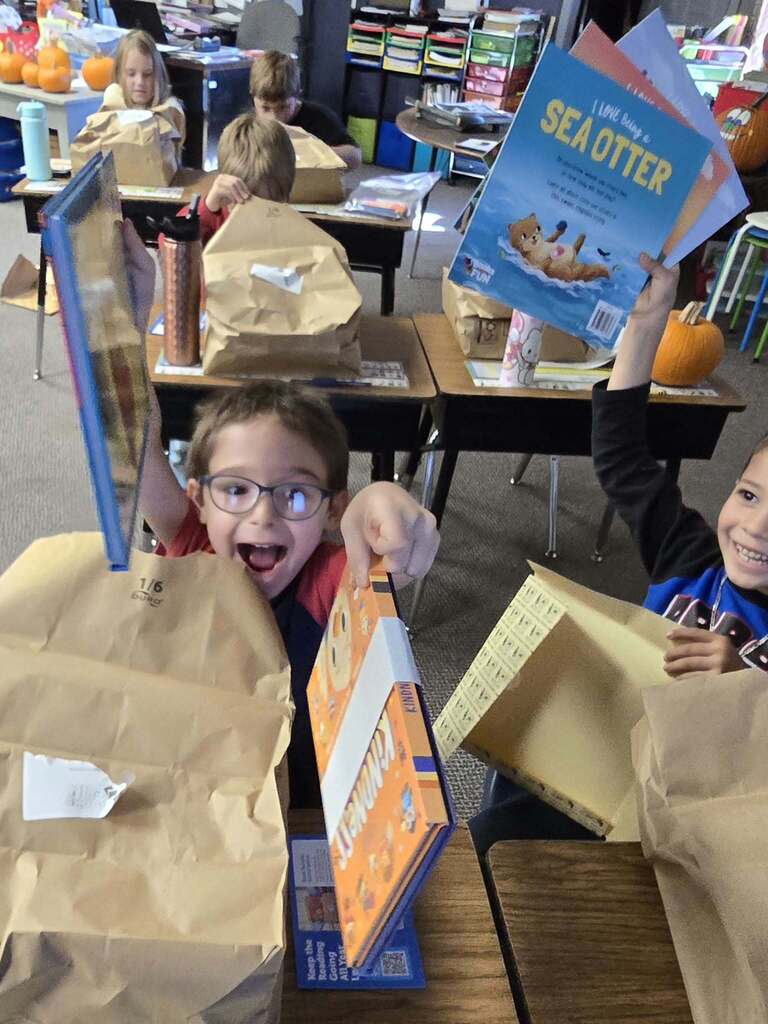 a boy and her book