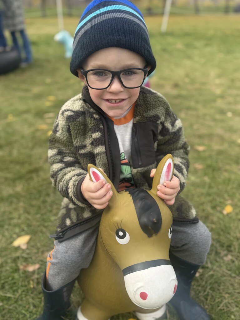 a boy on a horse