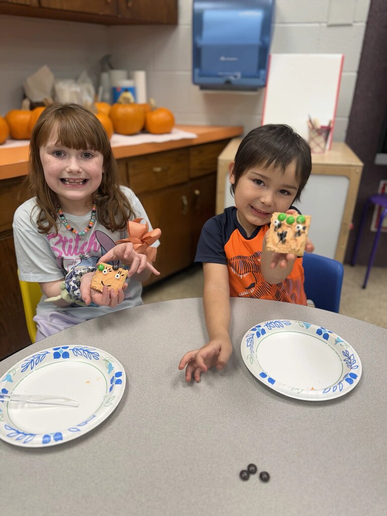 2 kids with treats