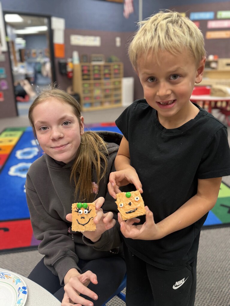 2 kids with their treats
