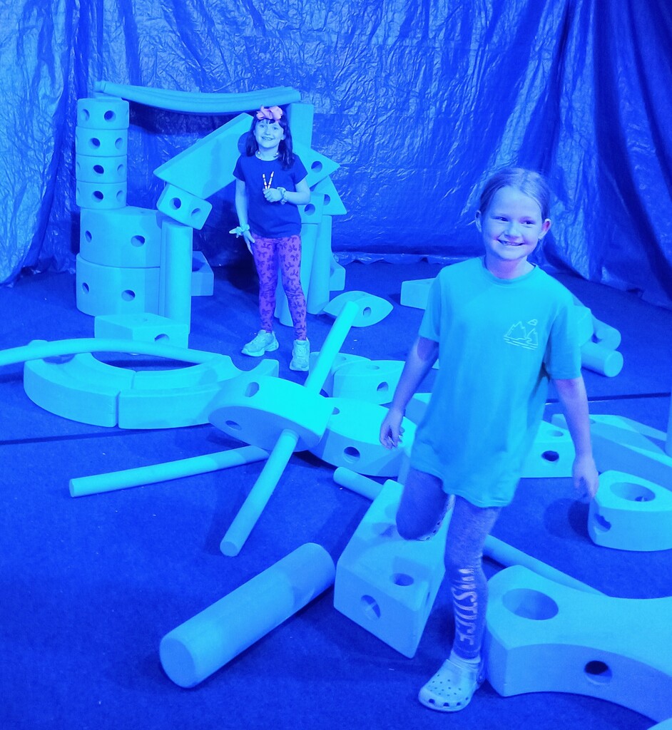 kids building with foam blocks