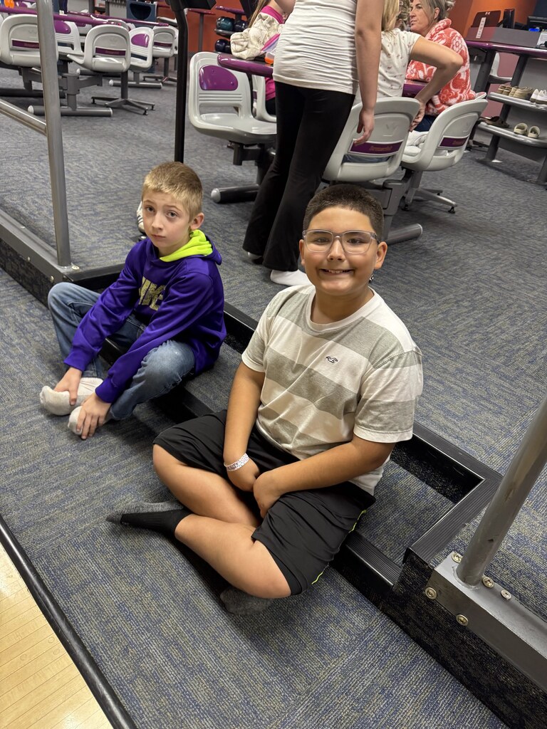 2 boys waiting to bowl