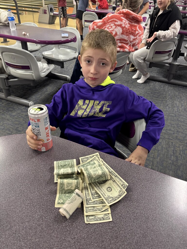 a boy with some money